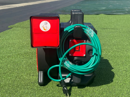 Rear of the bounce house blower showing the power switch and cord wrap